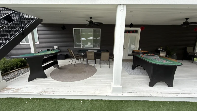 BC Event Makers casino tables set up on a covered patio